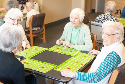Playing Bingo at Bria Retirement Community