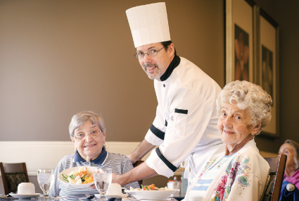 chef serving seniors
