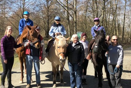 senior group riding horses