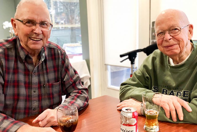 Senior Men drinking beer