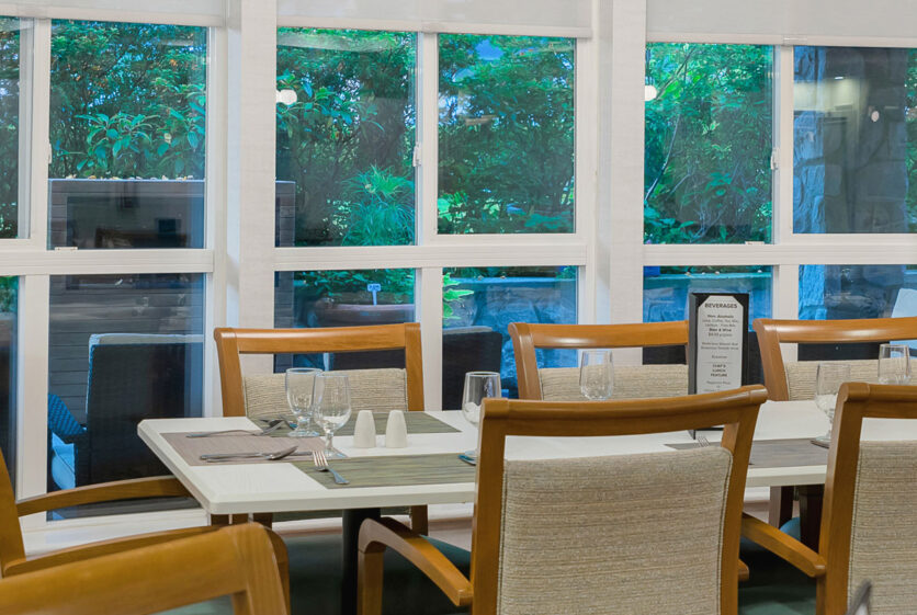 The Waterford dining room tables with patio view