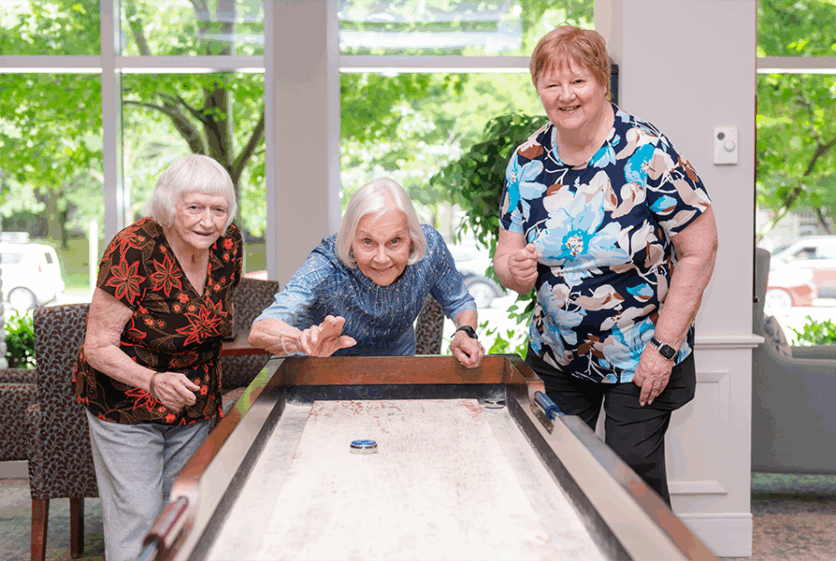 seniors playing shuffleboard