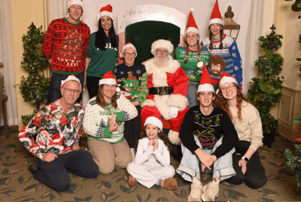 Sunridge Gardens resident and family with Santa