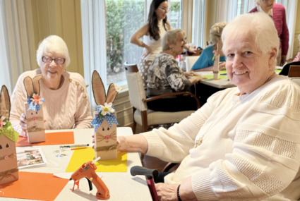 Vibrant and active senior ladies working on Easter crafts